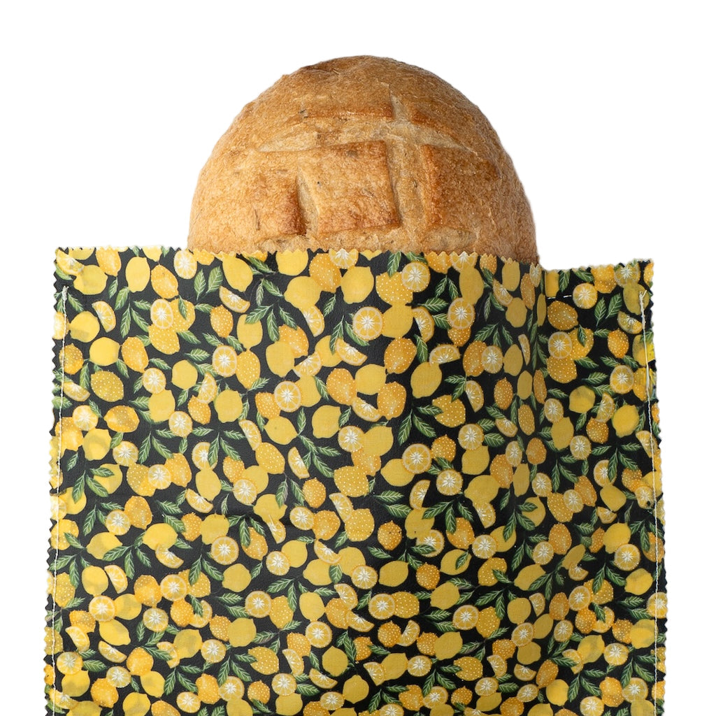 Bread loaf on a green and yellow patterned cloth